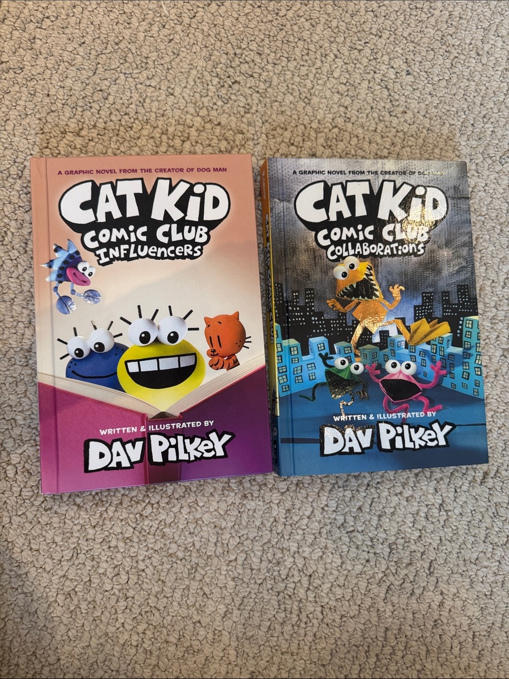 Scholastic Cat Kid Comic Club Graphic Novels - Pink and Blue Covers